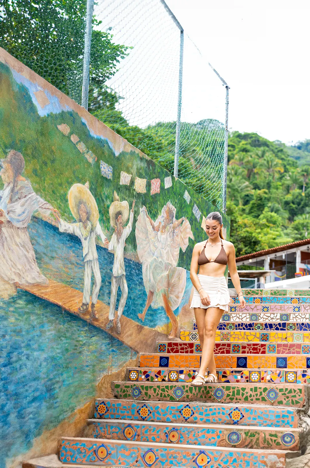 Traveler admiring Yelapa colorful murals.