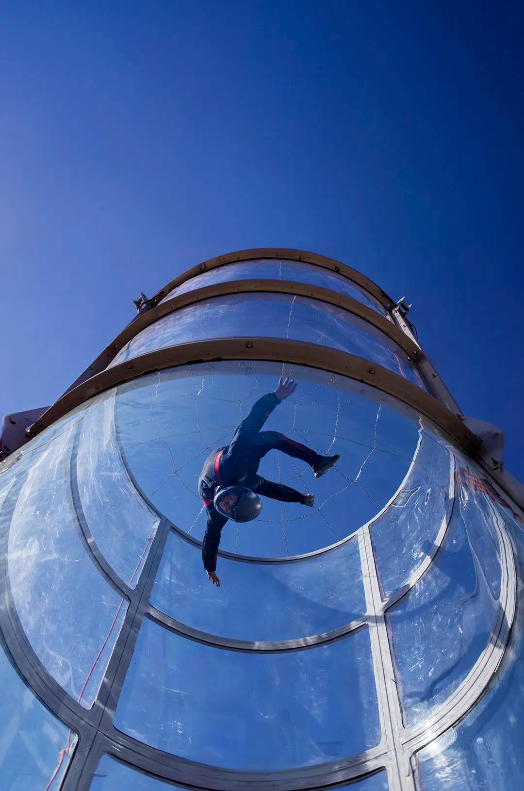 Man practicing on a Sky Diving Simulator in the only Puerto Vallarta Wind Tunnel.