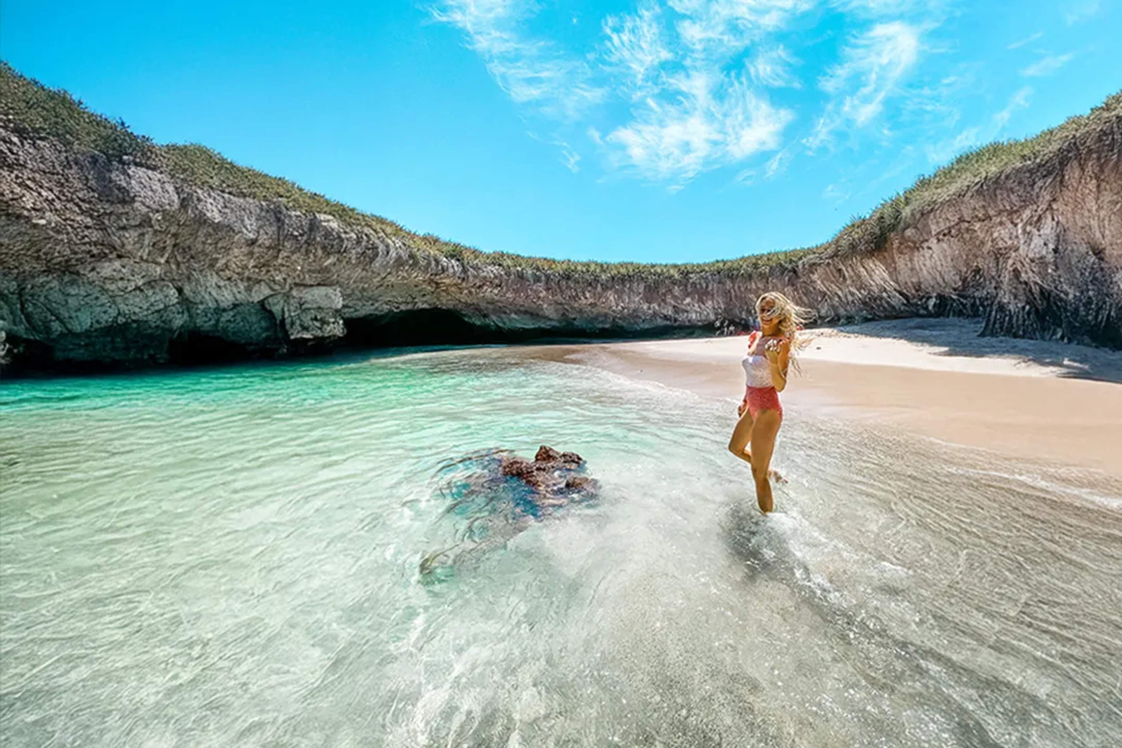 Hidden Beach at Islas Marietas, crystal-clear waters and iconic Puerto Vallarta island tour.