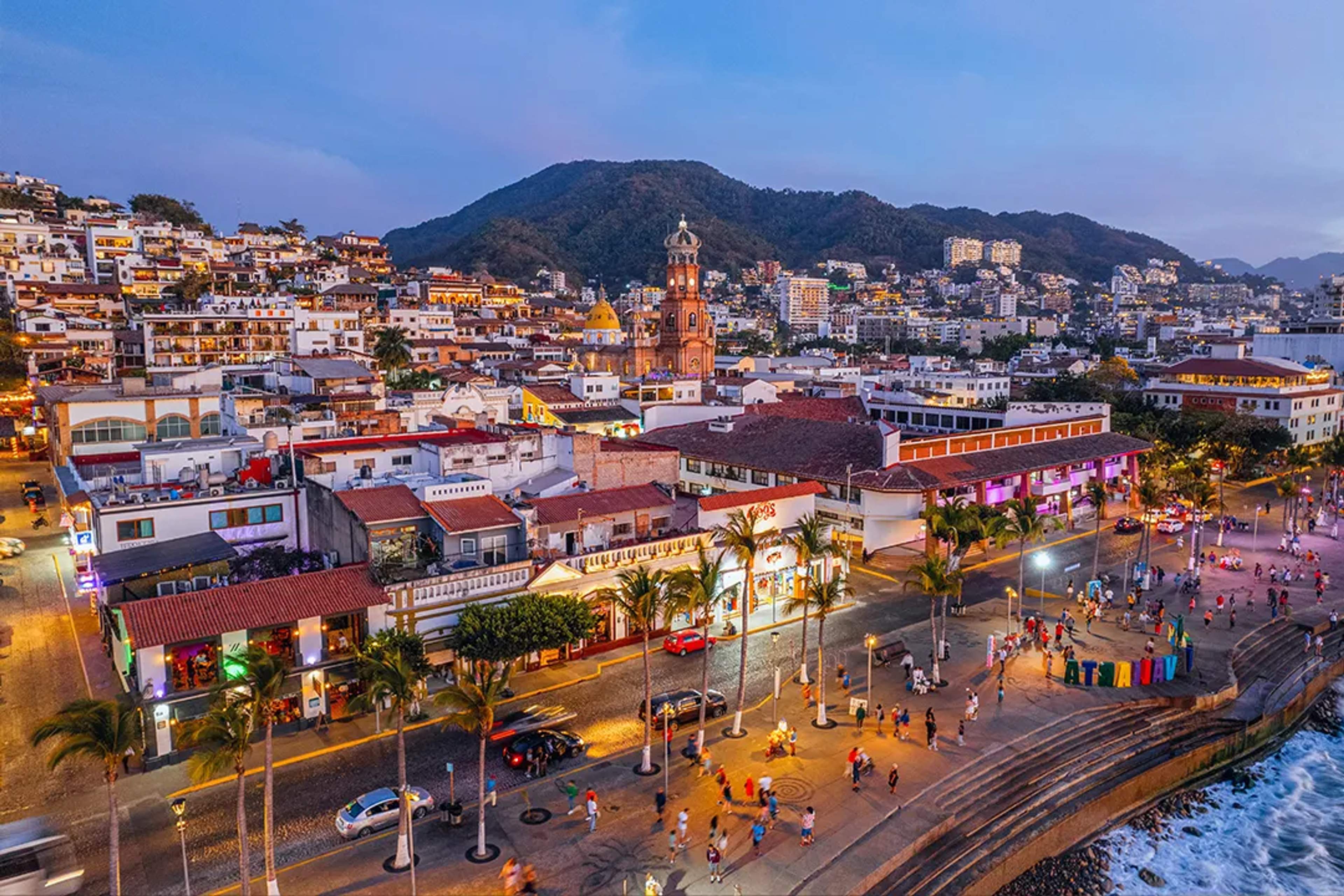 Aerial view of Puerto Vallarta Malecón at sunset with Our Lady of Guadalupe Church