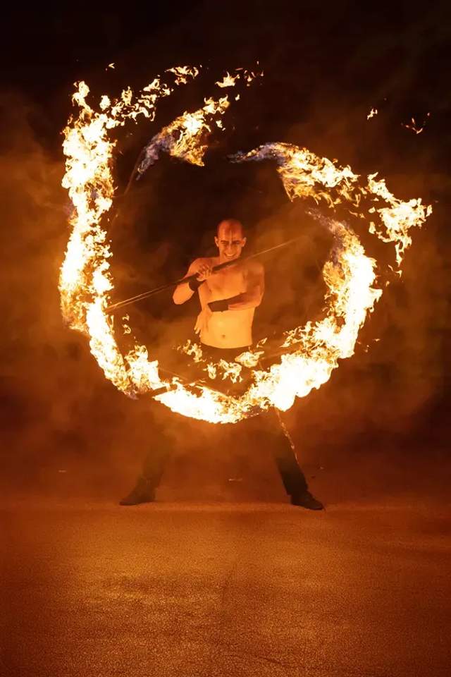 A fiery performance lights up the jungle during Rhythms of the Night, the #1 Puerto Vallarta nightlife activity.