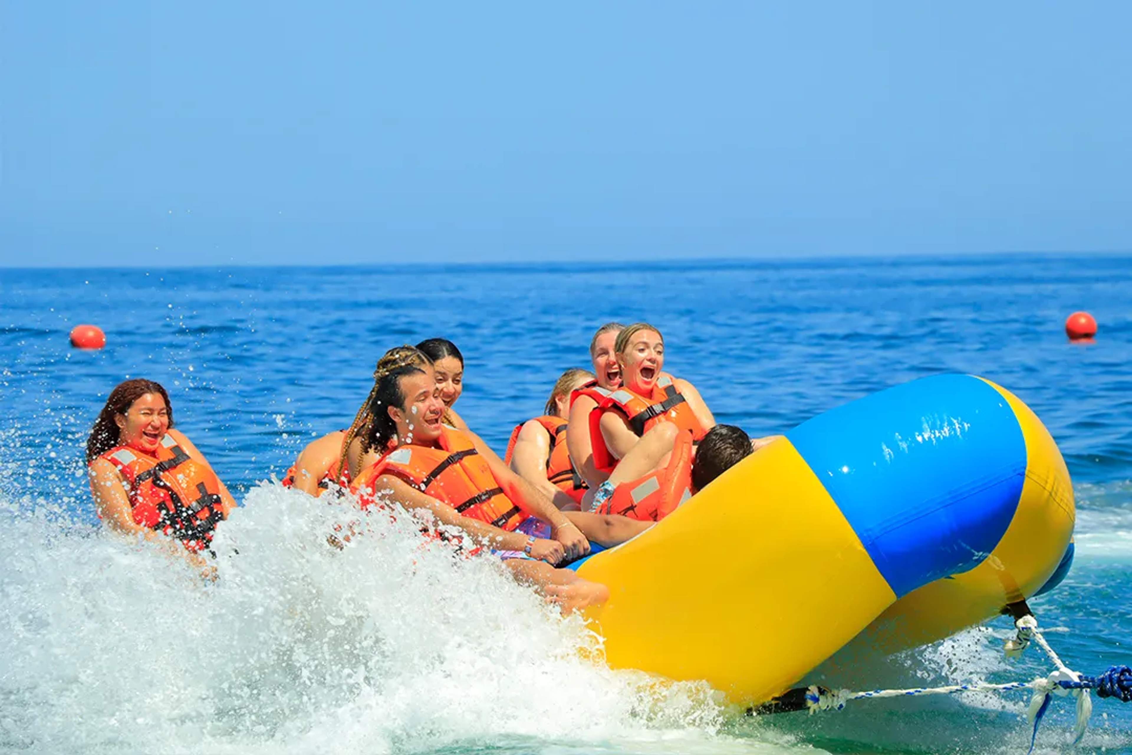 Ride a banana boat adventure in Puerto Vallarta, splashing through waves for a fun-filled ocean experience.