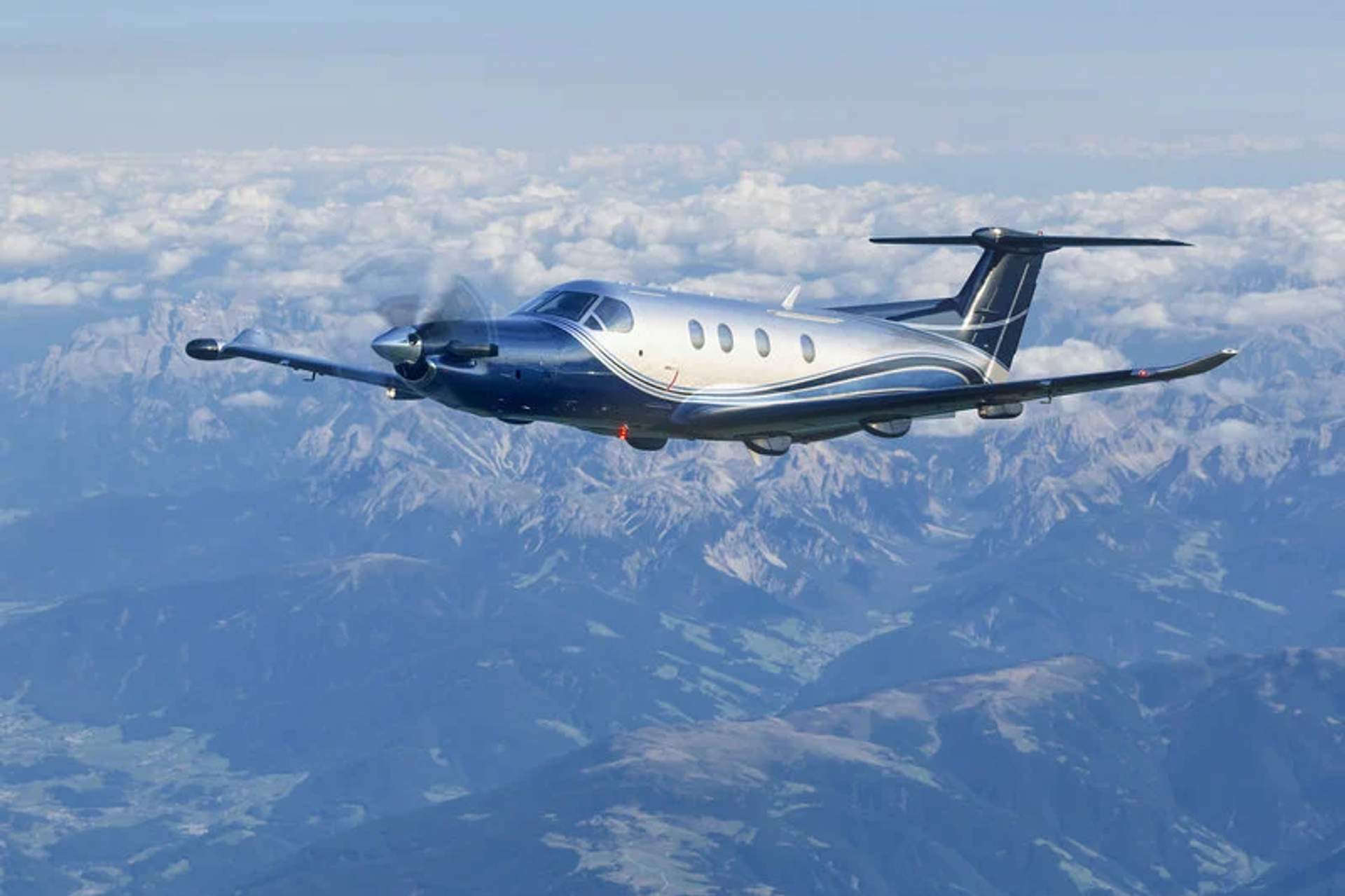 A private plane in flight, available for rent through Vallarta Adventures for exclusive trips to various destinations.