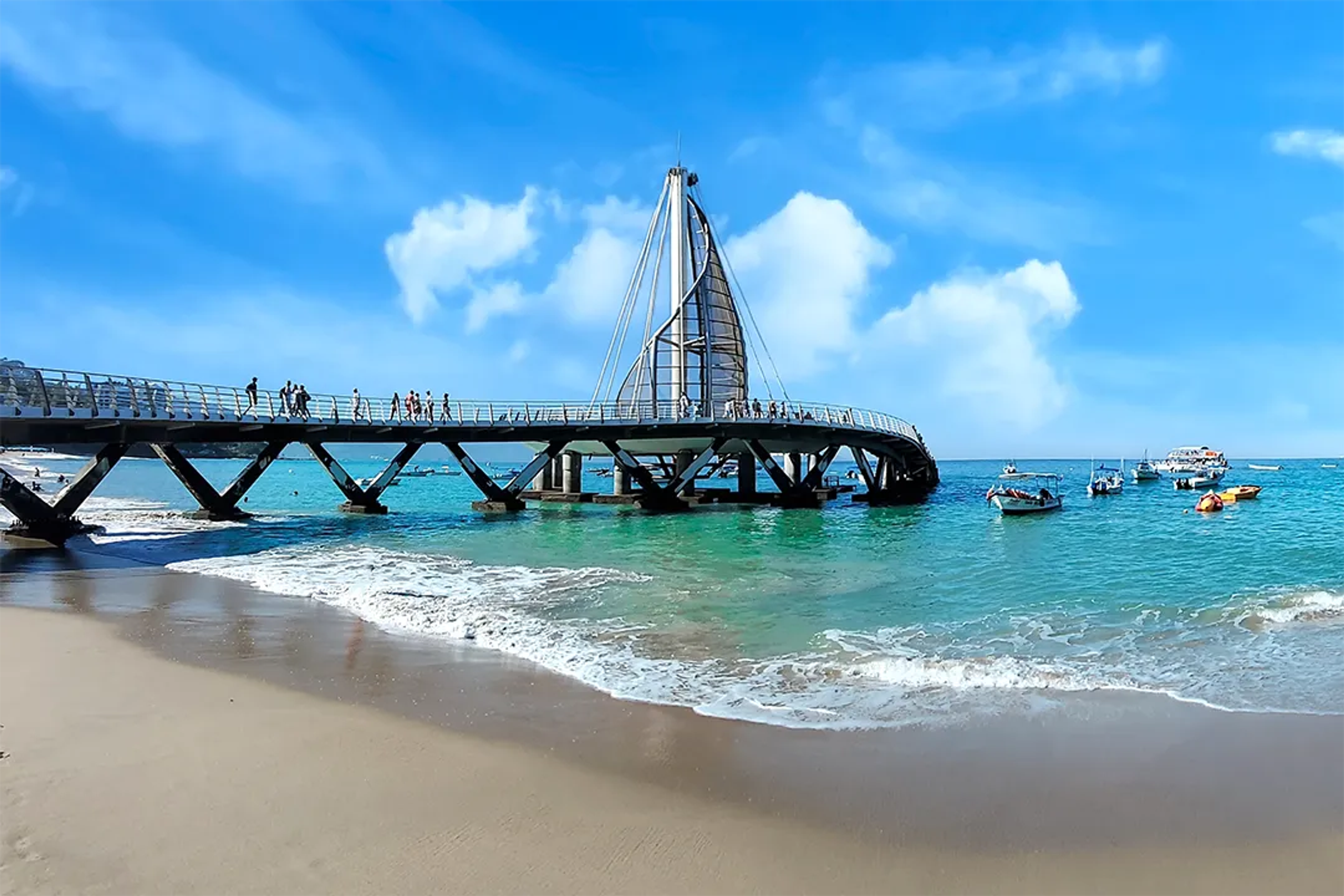 Sunny skies over Puerto Vallarta's lush coastline, perfect for a tropical getaway.