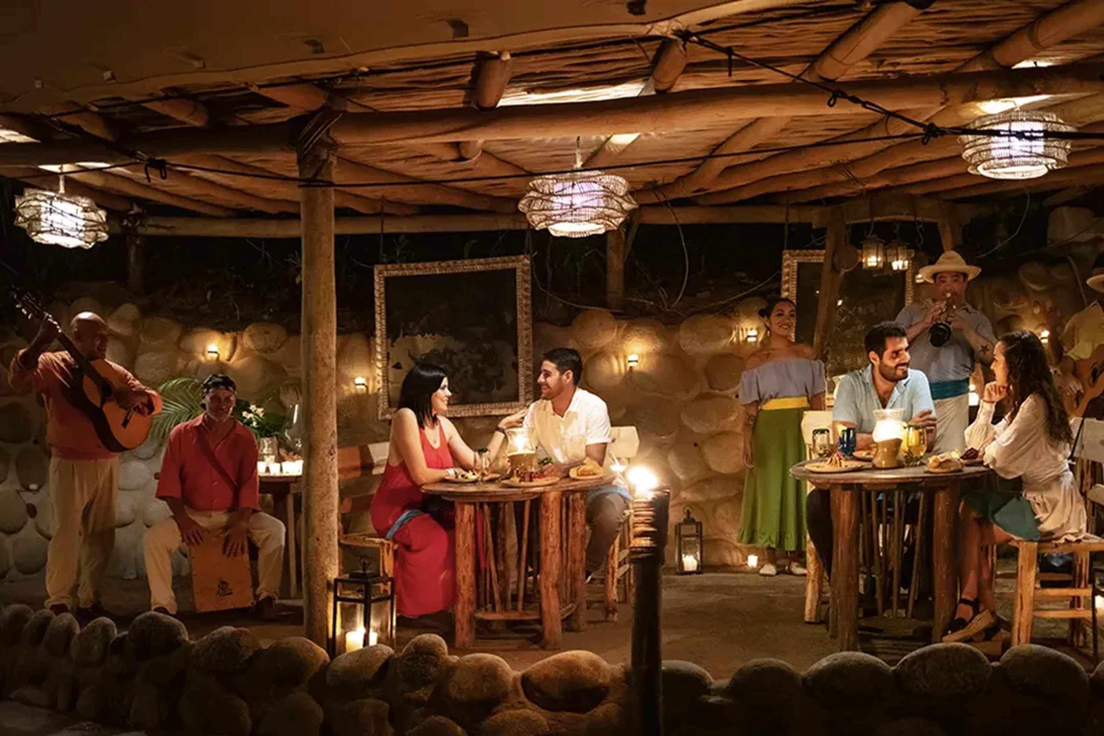 Couples enjoying romantic seaside dinner at ALMA, Rhythms of the Night in Puerto Vallarta