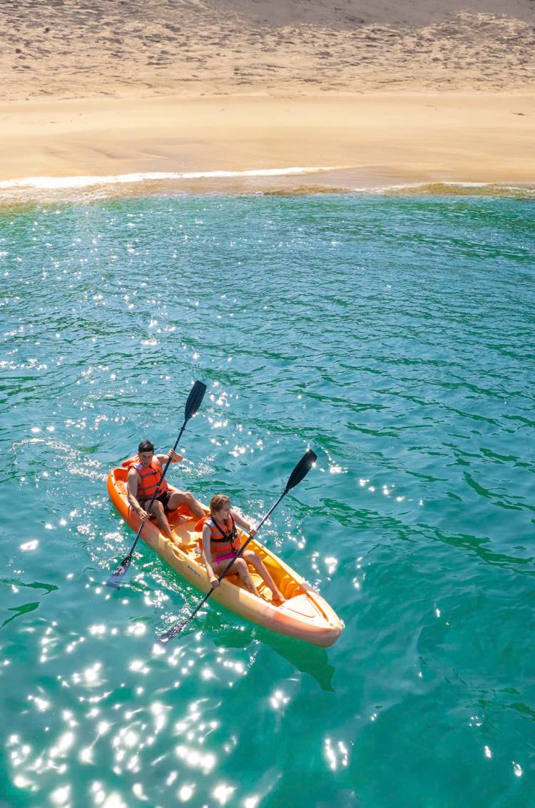 Couple kayaking at Majahuitas.