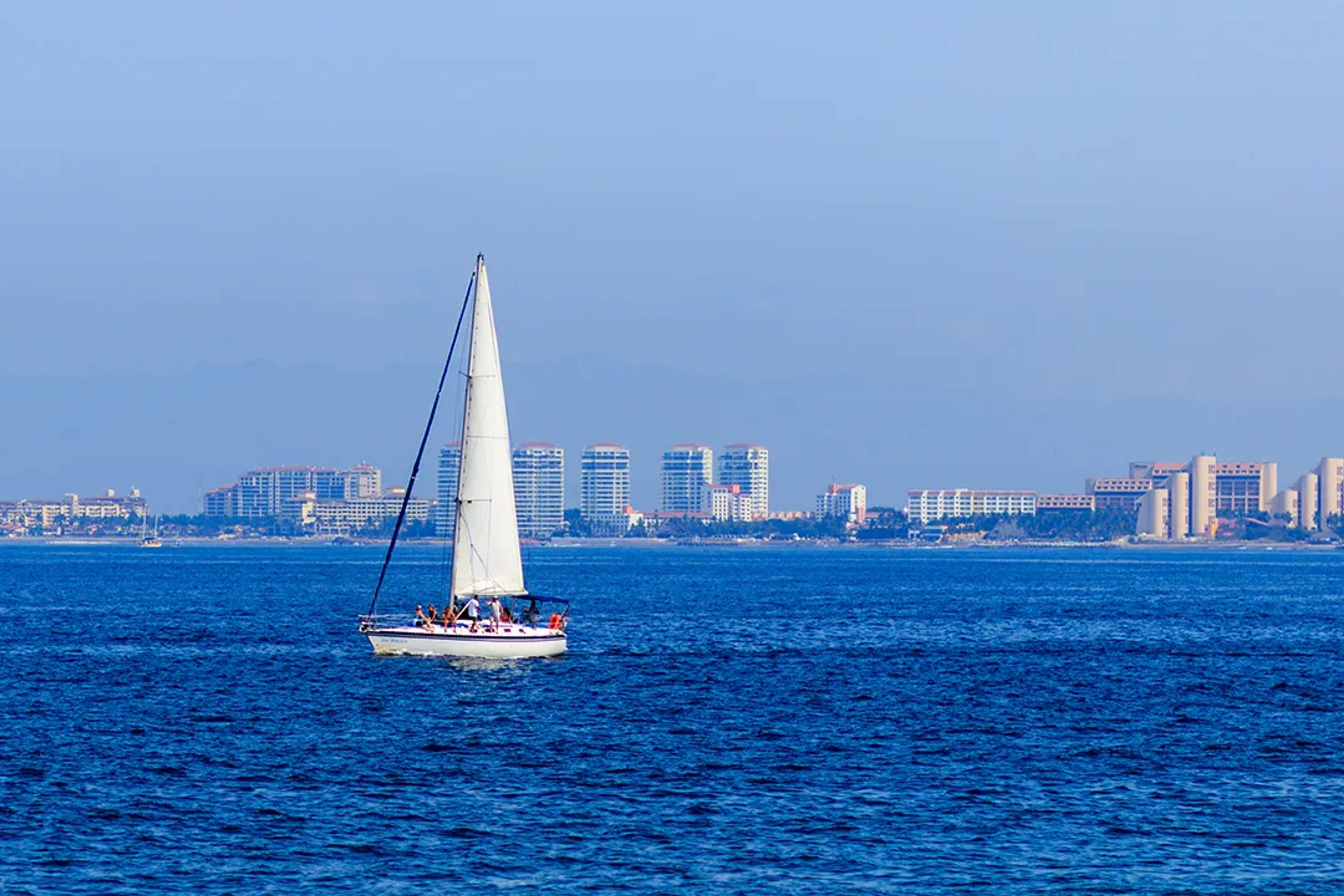Luxury Sailing boat cruising Banderas Bay at Vallarta Adventures with panoramic Puerto Vallarta views