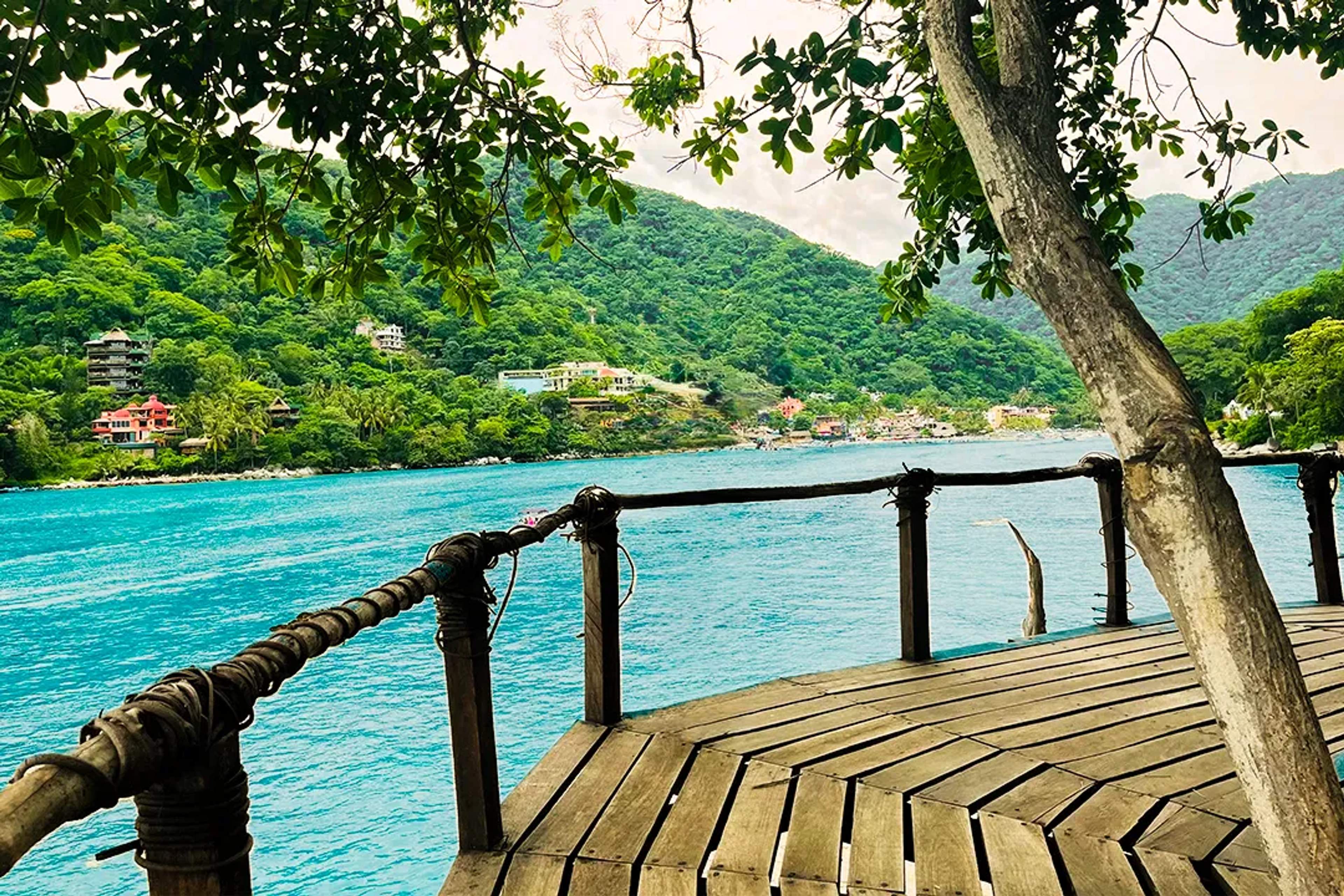 Relax at Boca de Tomatlán, a scenic Puerto Vallarta hideaway with ocean views, jungle hills, and calm