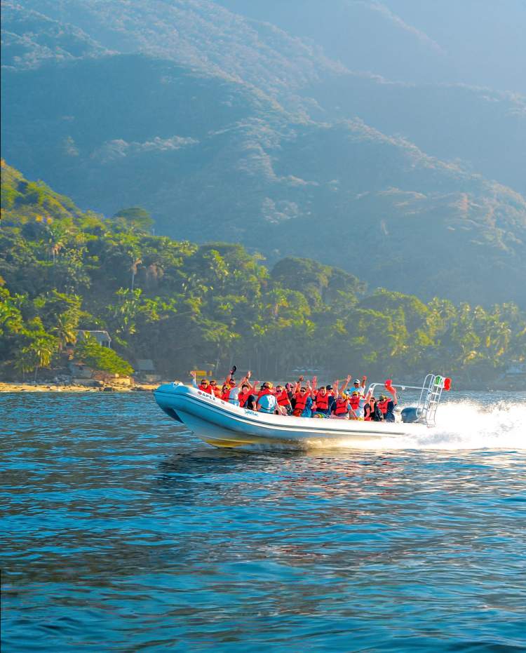Speed boat across Puerto Vallarta bay toward Outdoor Adventure.