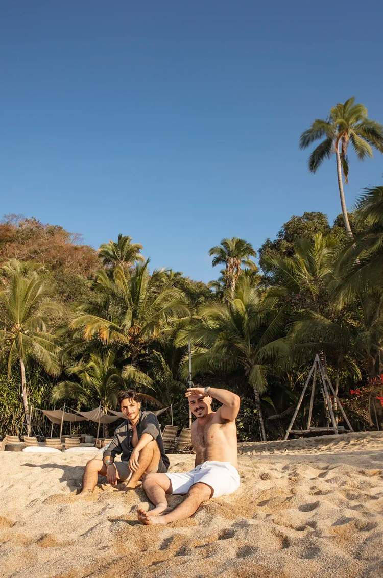 Friends sunbathing at Majahuitas after lunch.