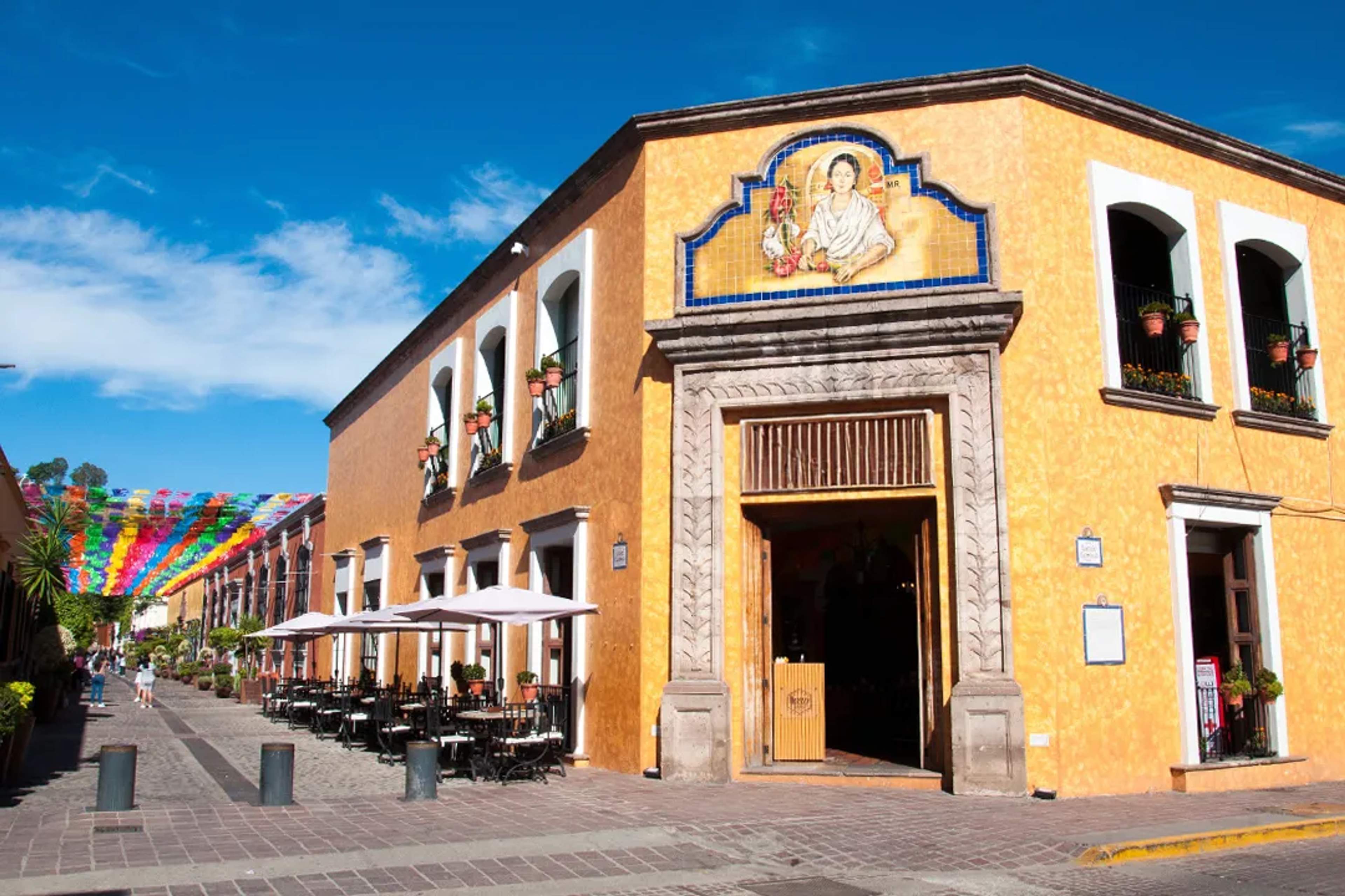 Colorful colonial street in Tequila Jalisco with historic architecture and festive papel picado