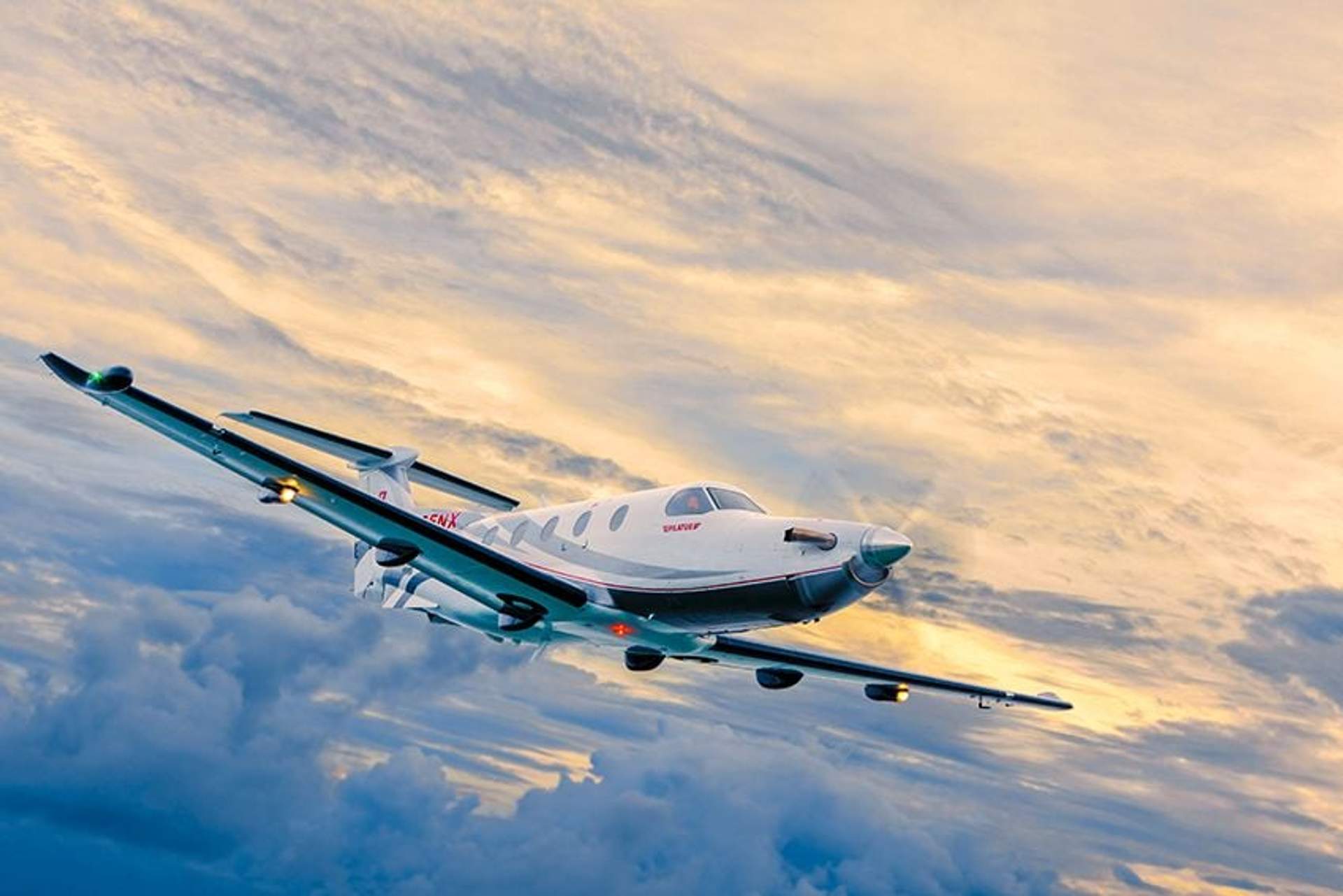 Private plane flying over clouds en route to Puerto Vallarta.