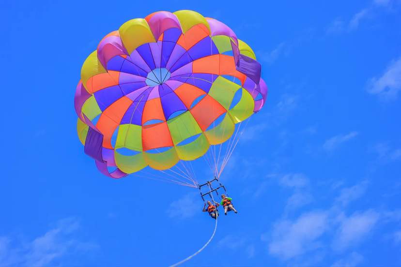 Parasailing in Puerto Vallarta, soaring above the ocean with panoramic views on an unforgettable water adventure.