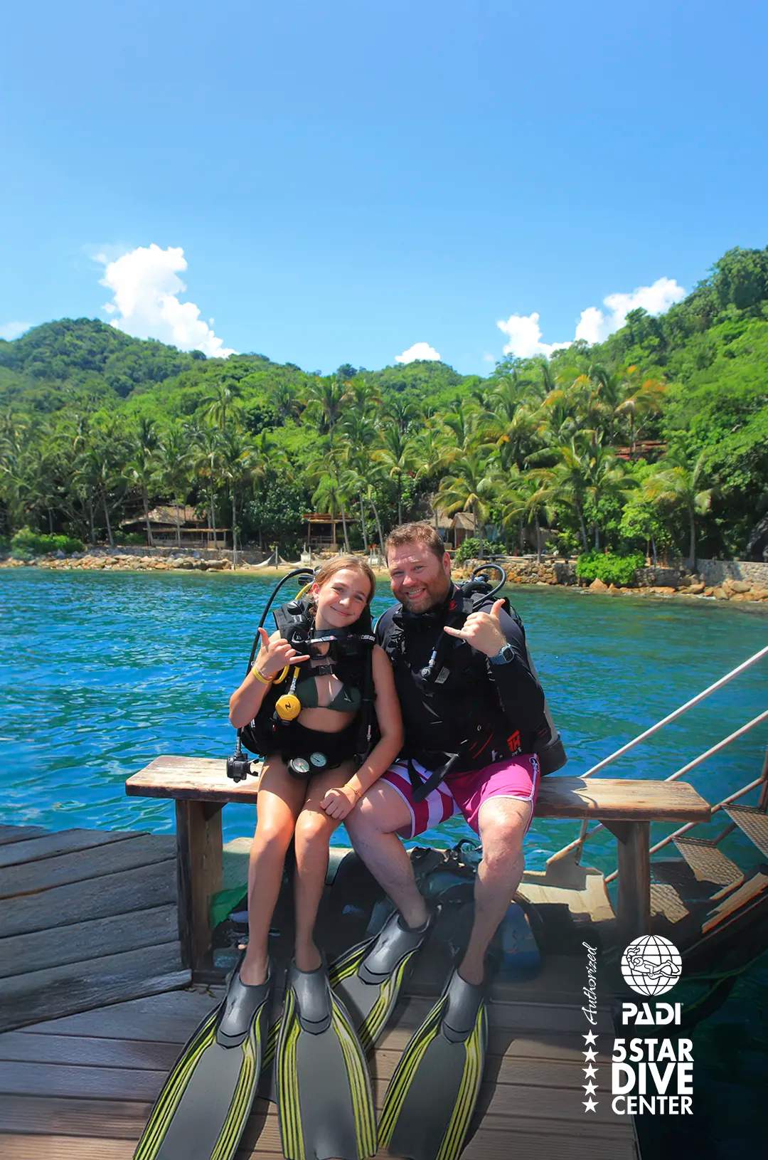 Two beginner scuba divers at Las Caletas for their first scuba diving lessons in Puerto Vallarta.