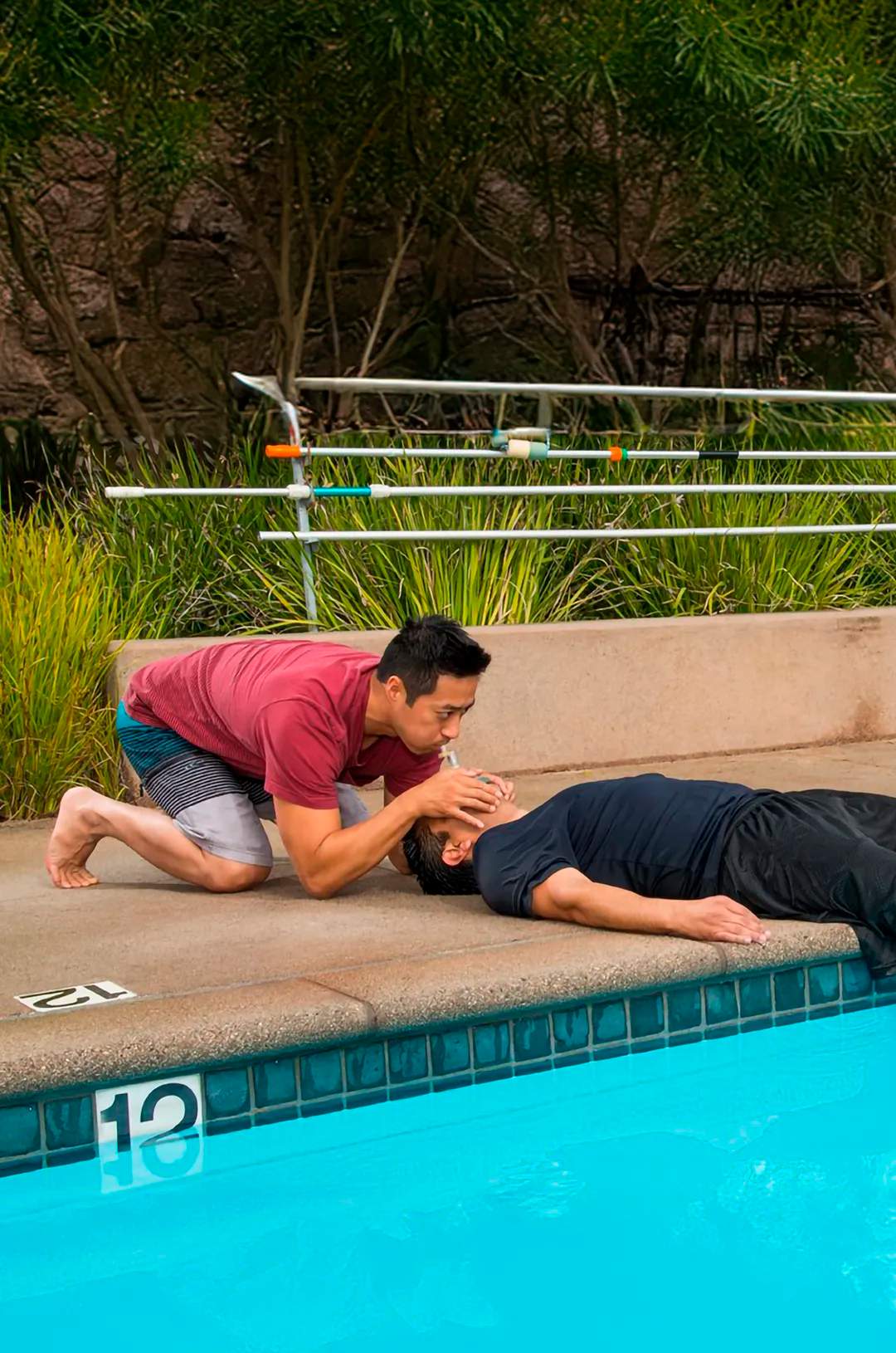 Student practicing mouth-to-mouth resuscitation during the PADI Emergency First Response course.