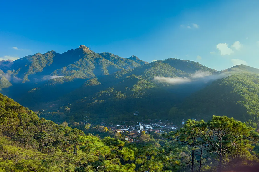 Panoramic view of a small town from the mountains