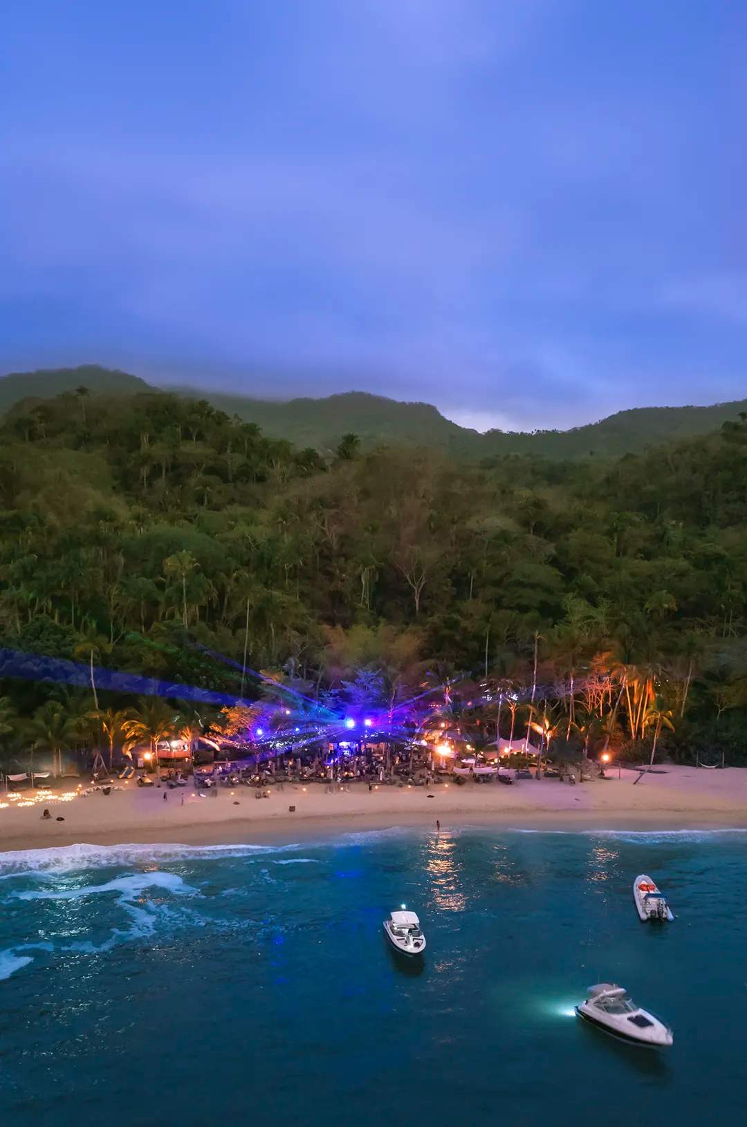 Aerial view of Majahuitas beach at night.