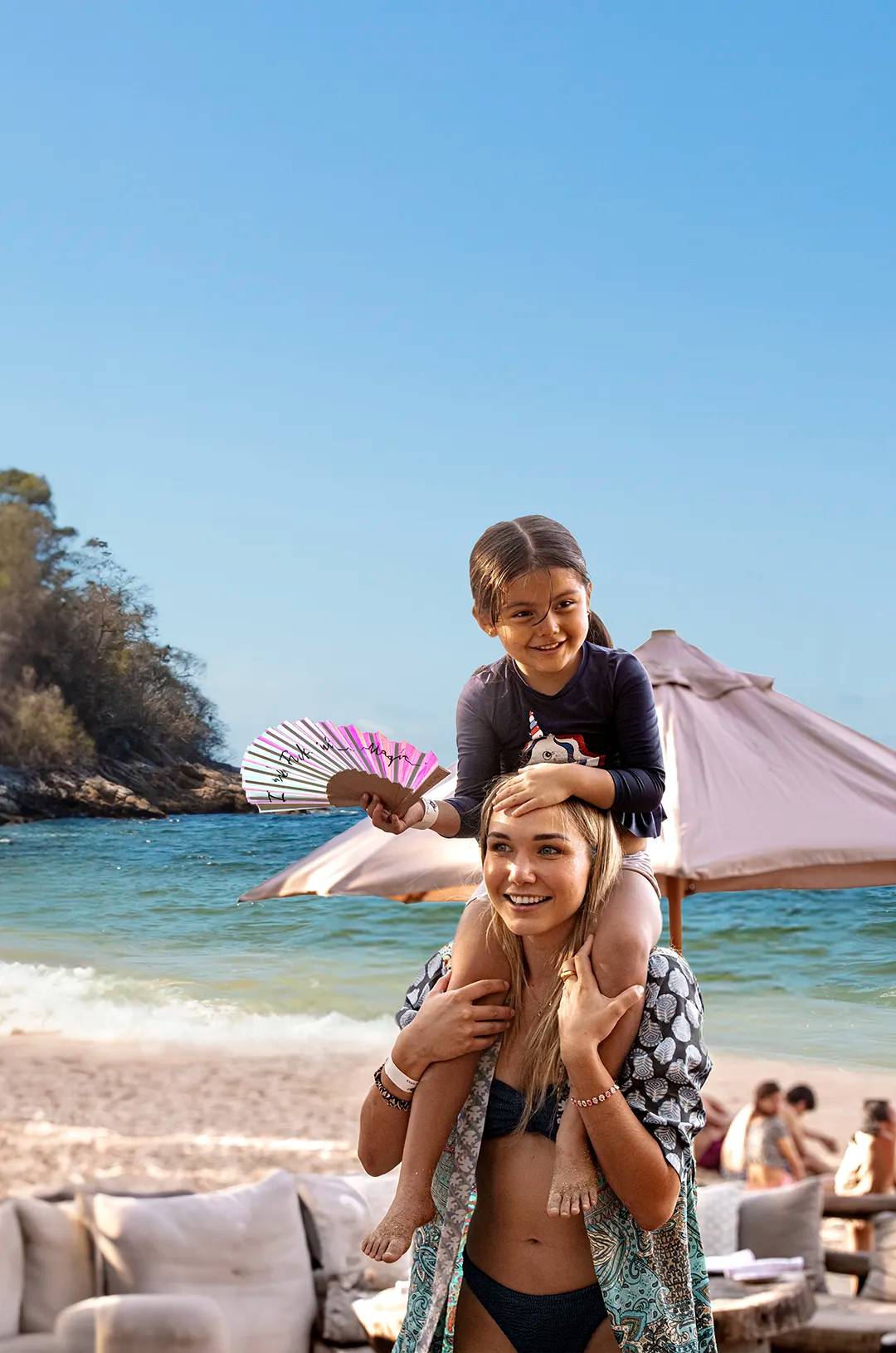 Mom with her child at Majahuitas beach.