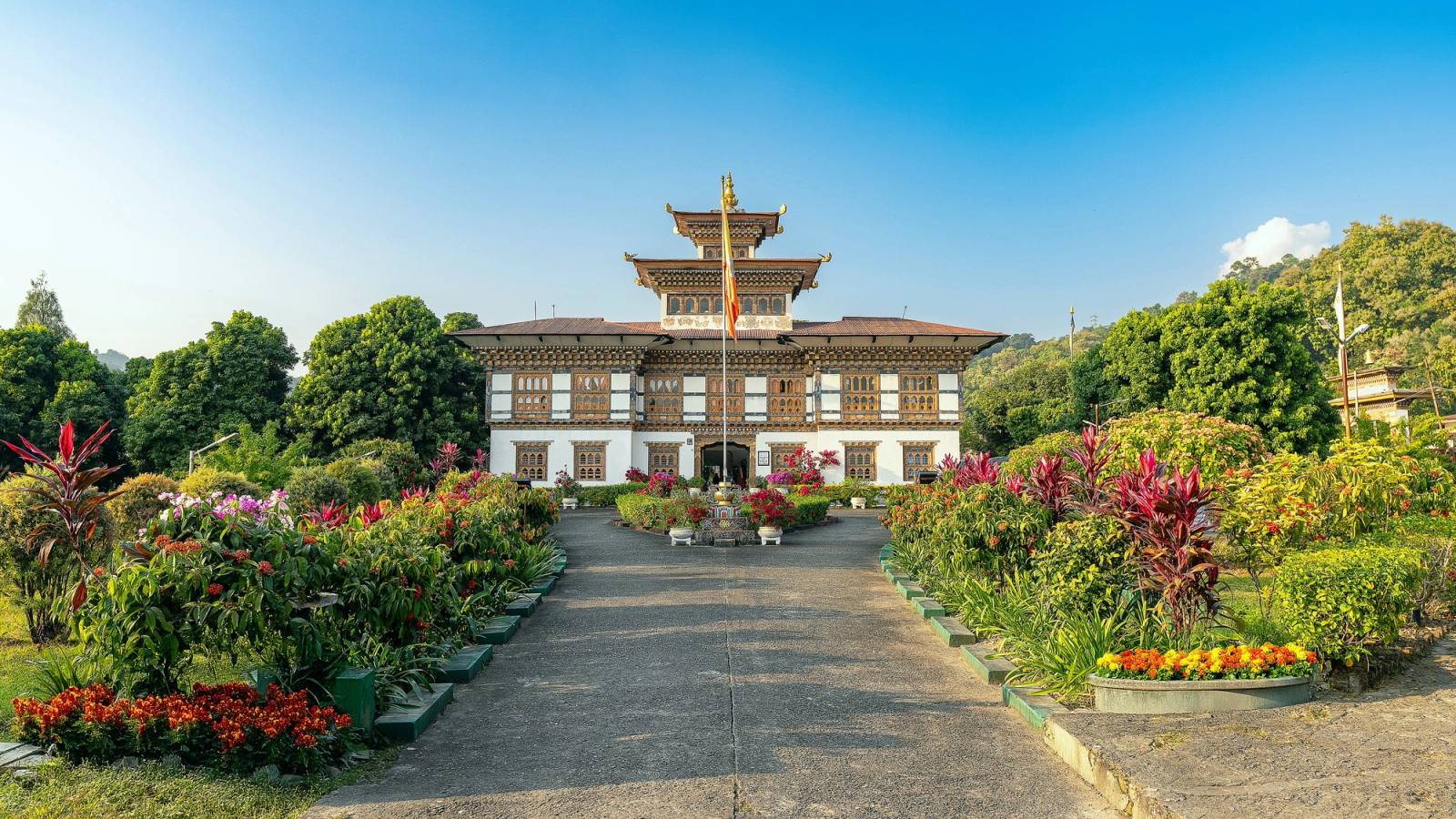 Samdrup Jongkhar's dzongkhag office at the end of a path lined with flower beds