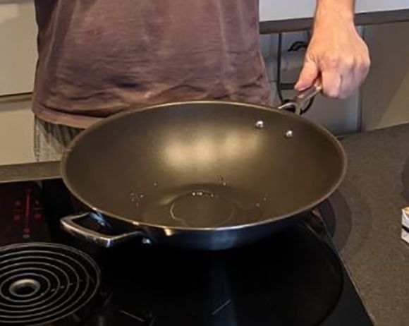 Olav Cookware with a happy customer