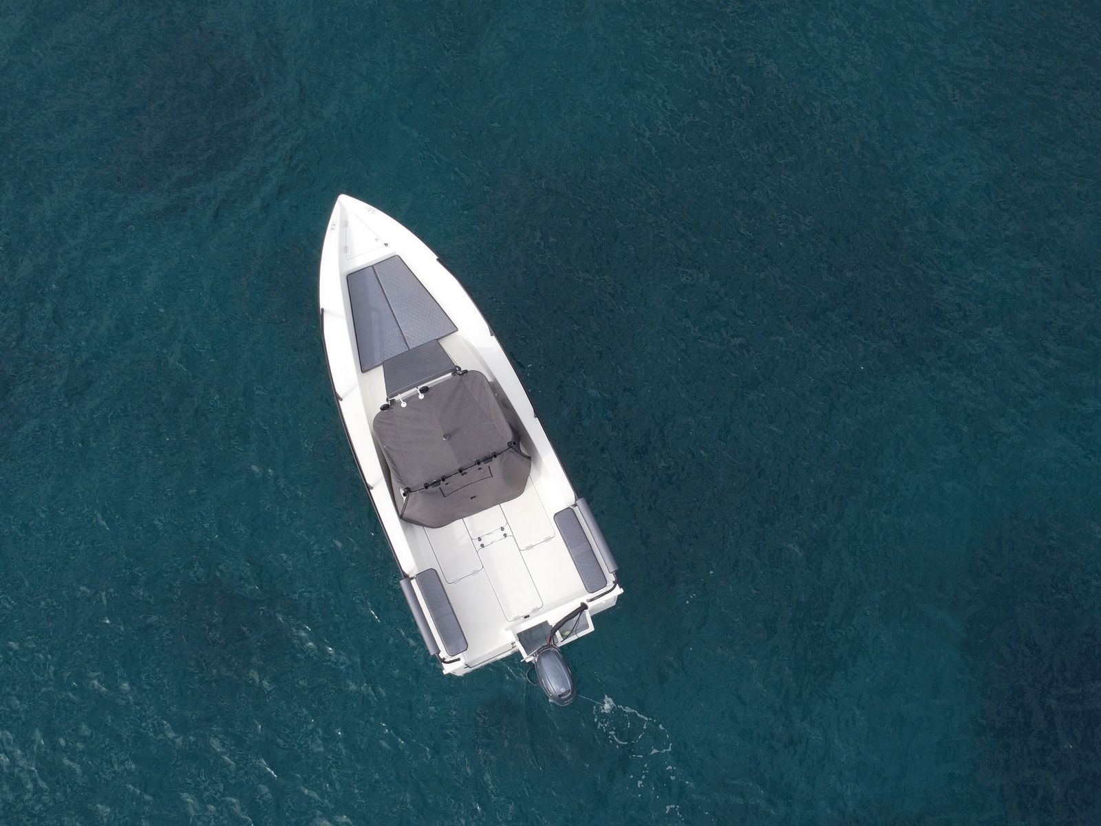EcoRunner 59 Gen2, straight-down aerial view, stationary, clean deck layout