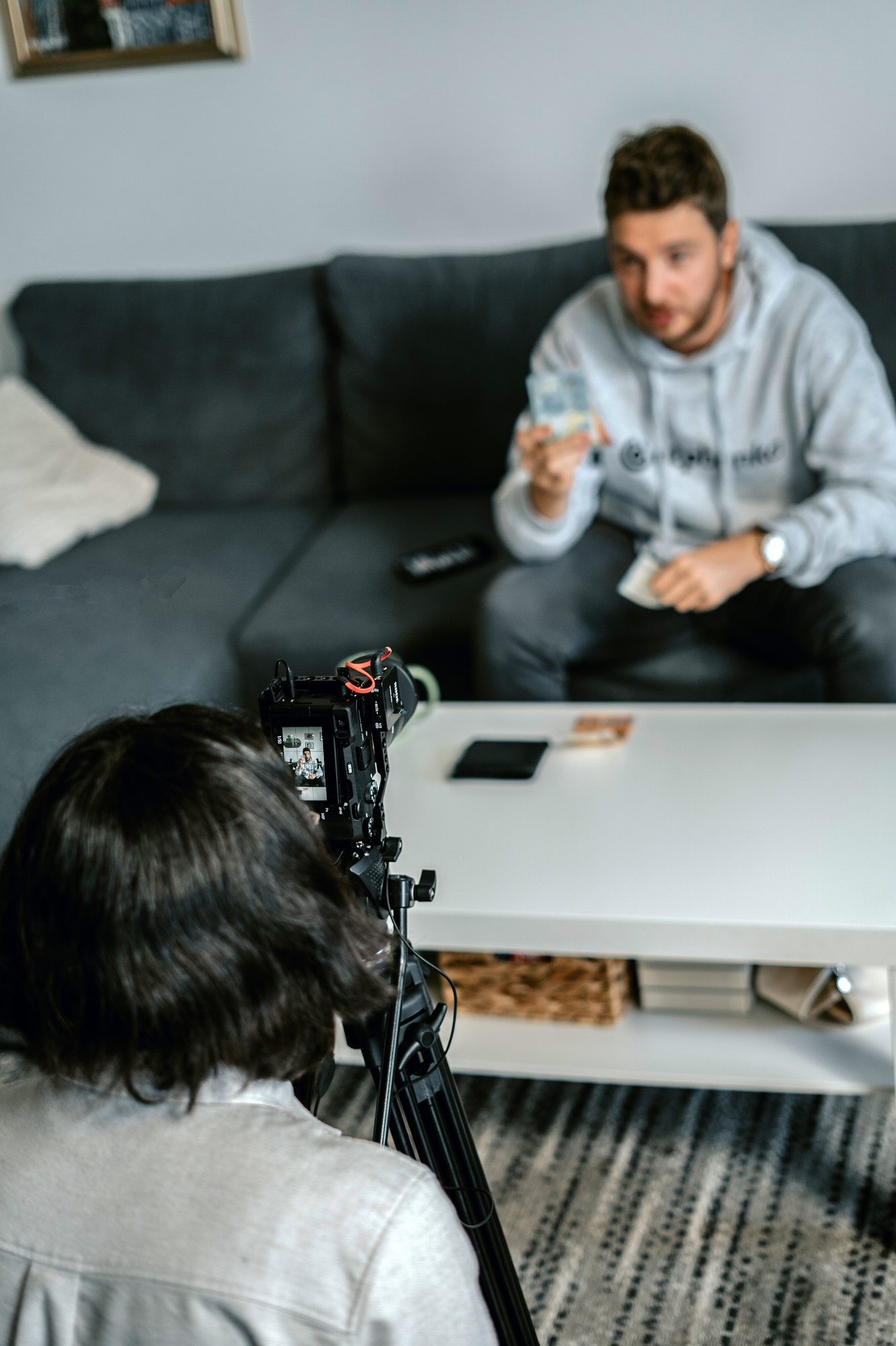Filming a shot by the wall