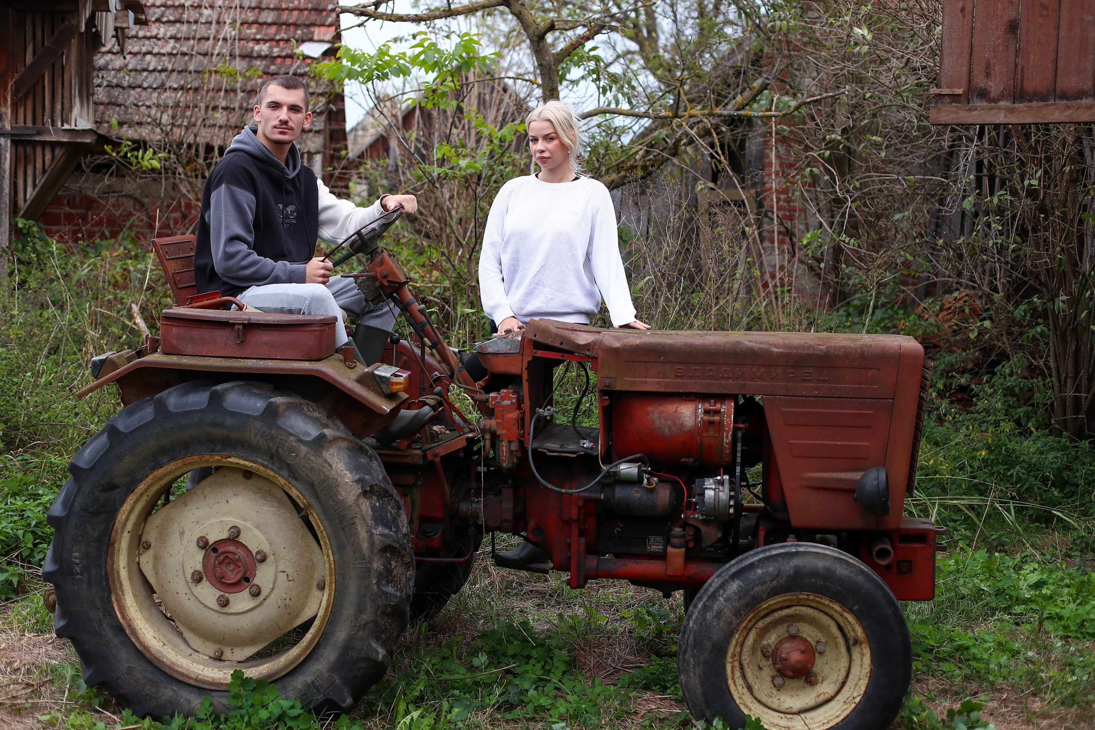 Contestants with a wheelbarrow of hay