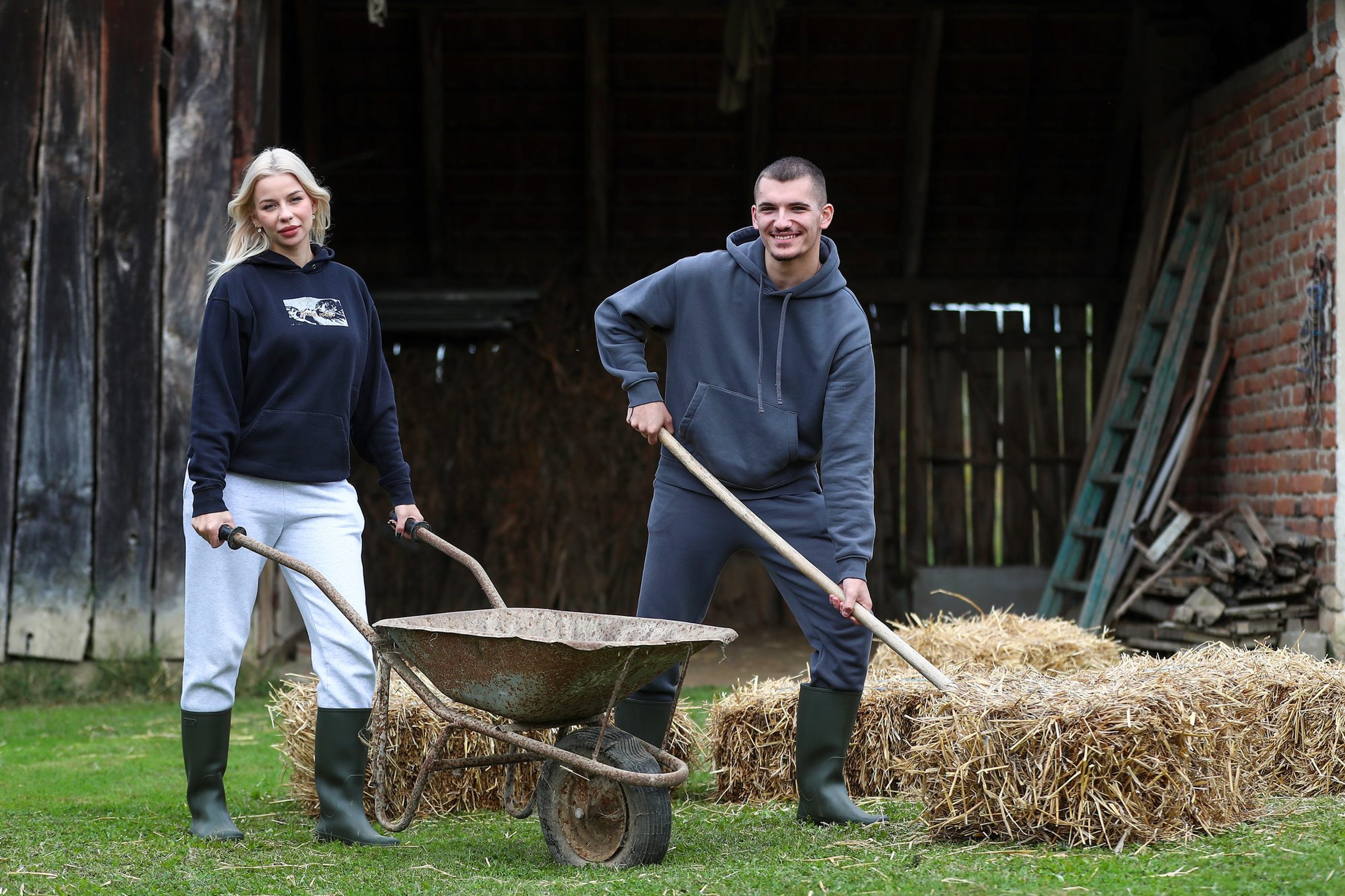 Contestants on an old tractor