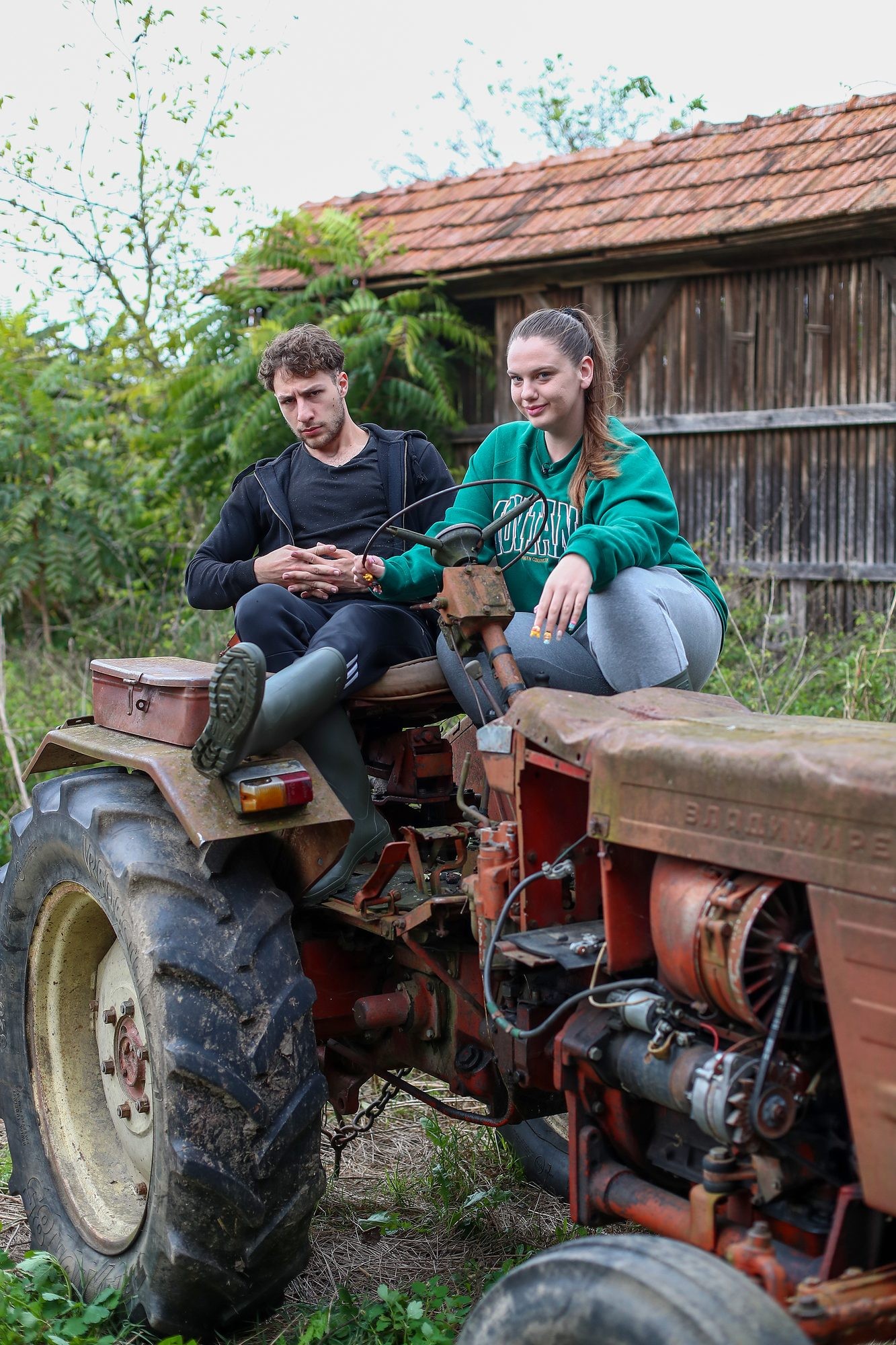 Contestants on a tractor