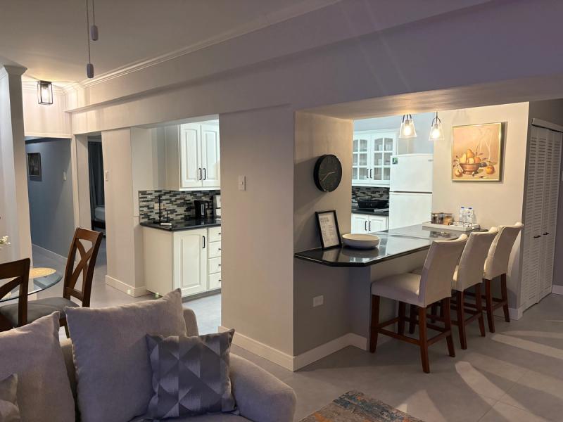 Living room & Kitchen area view with dining space