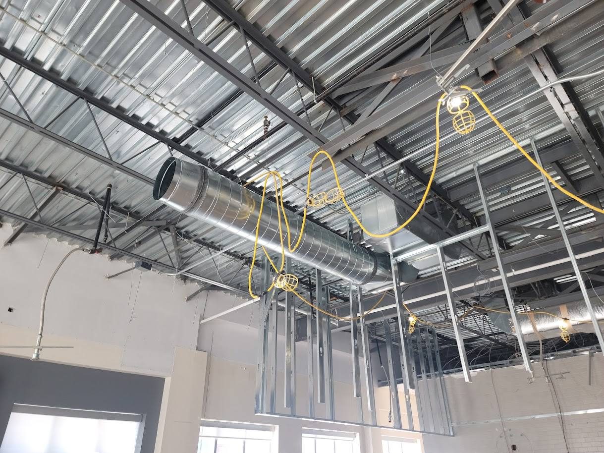 Ceiling ductwork rough-in during construction