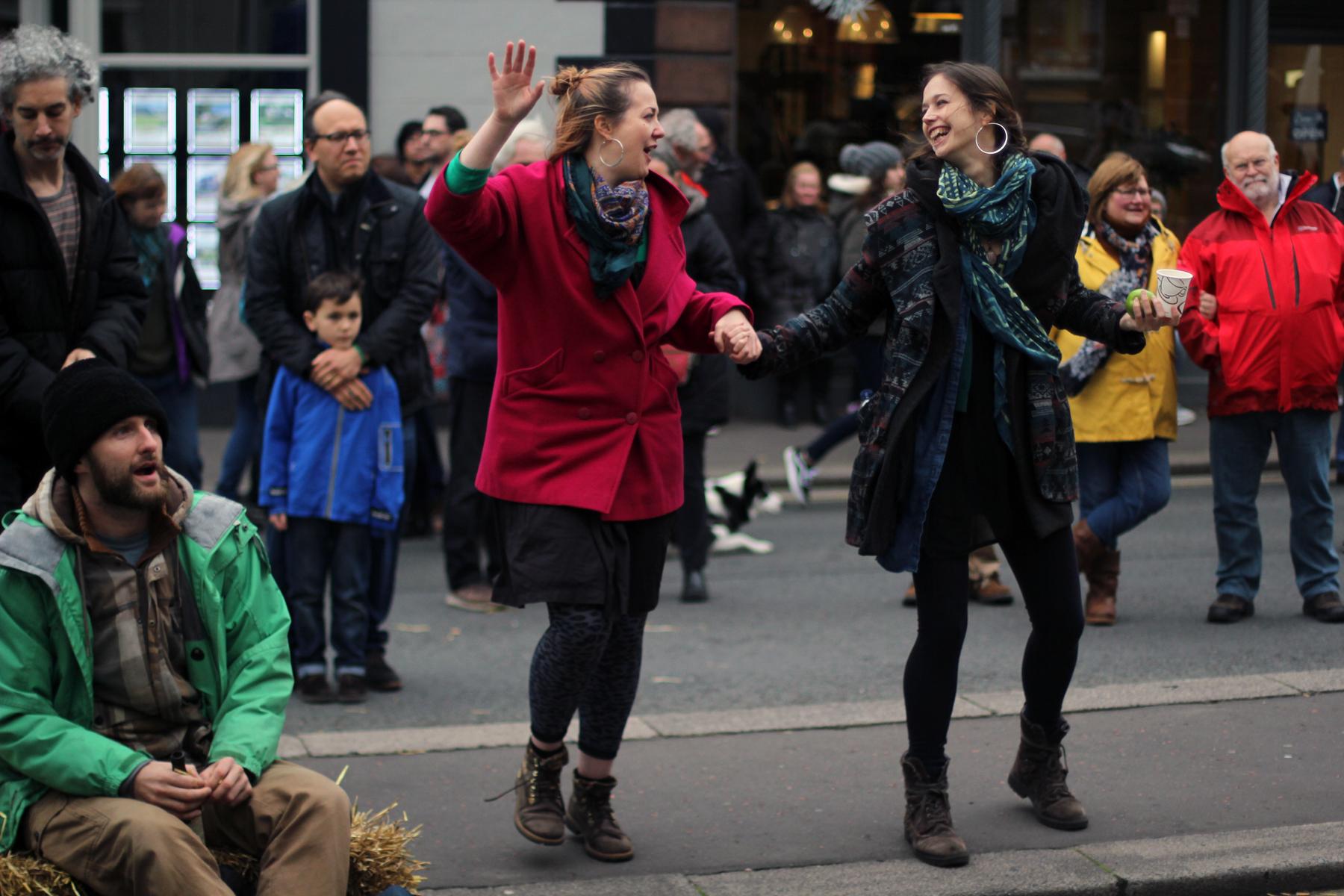 Audience members dancing