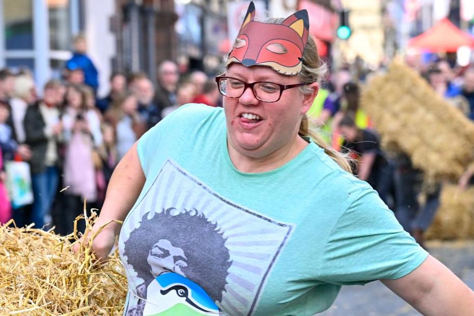 An attendee wearing a fox mask