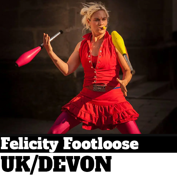 Performer juggling in red costume