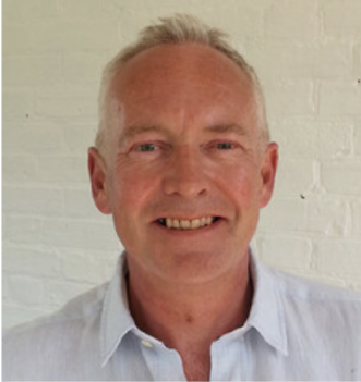 A portrait of Adrian Lochhead, the event director.