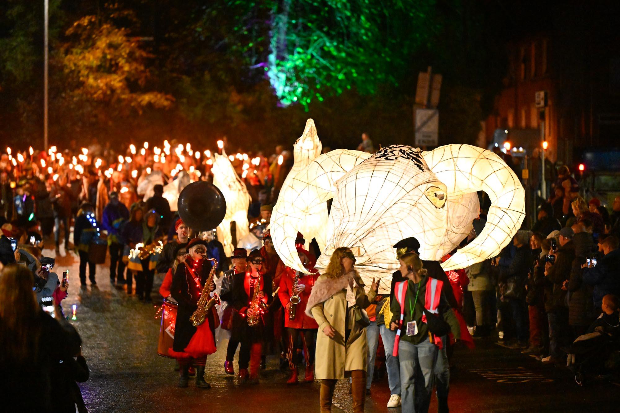 Winter Droving procession, including a ram's head lantern and torchbearers