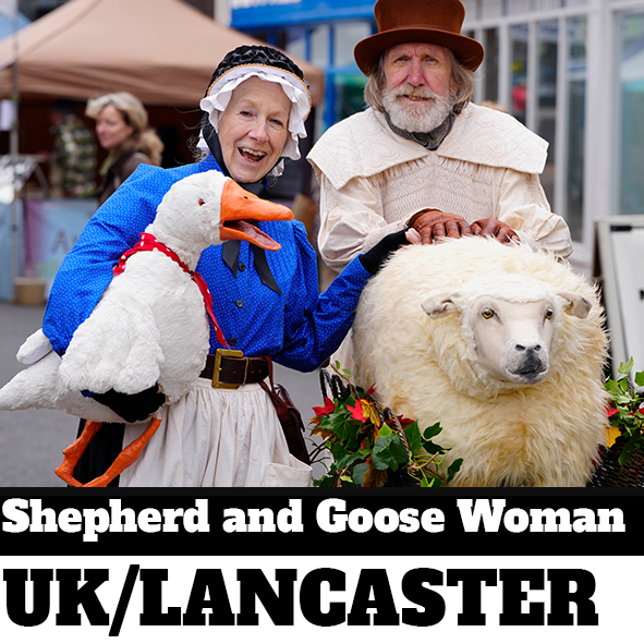 Shepherd with sheep puppet, and woman with goose puppet