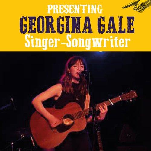 Georgina Gale playing guitar