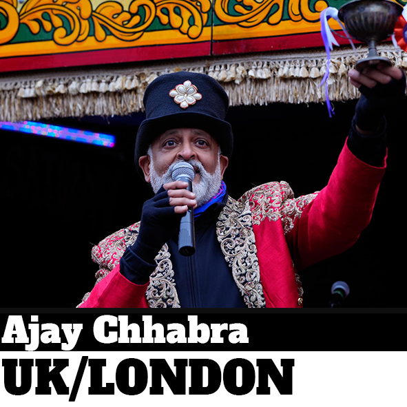Performer on stage holding trophy