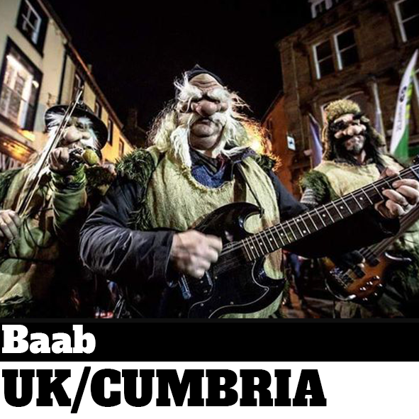 Baab performing in the street wearing masks