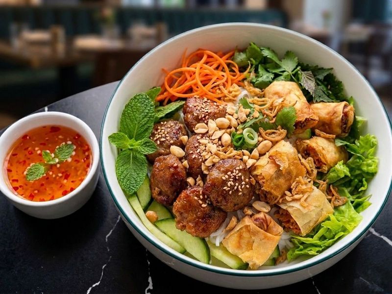 Grilled pork & spring rolls vermicelli bowl