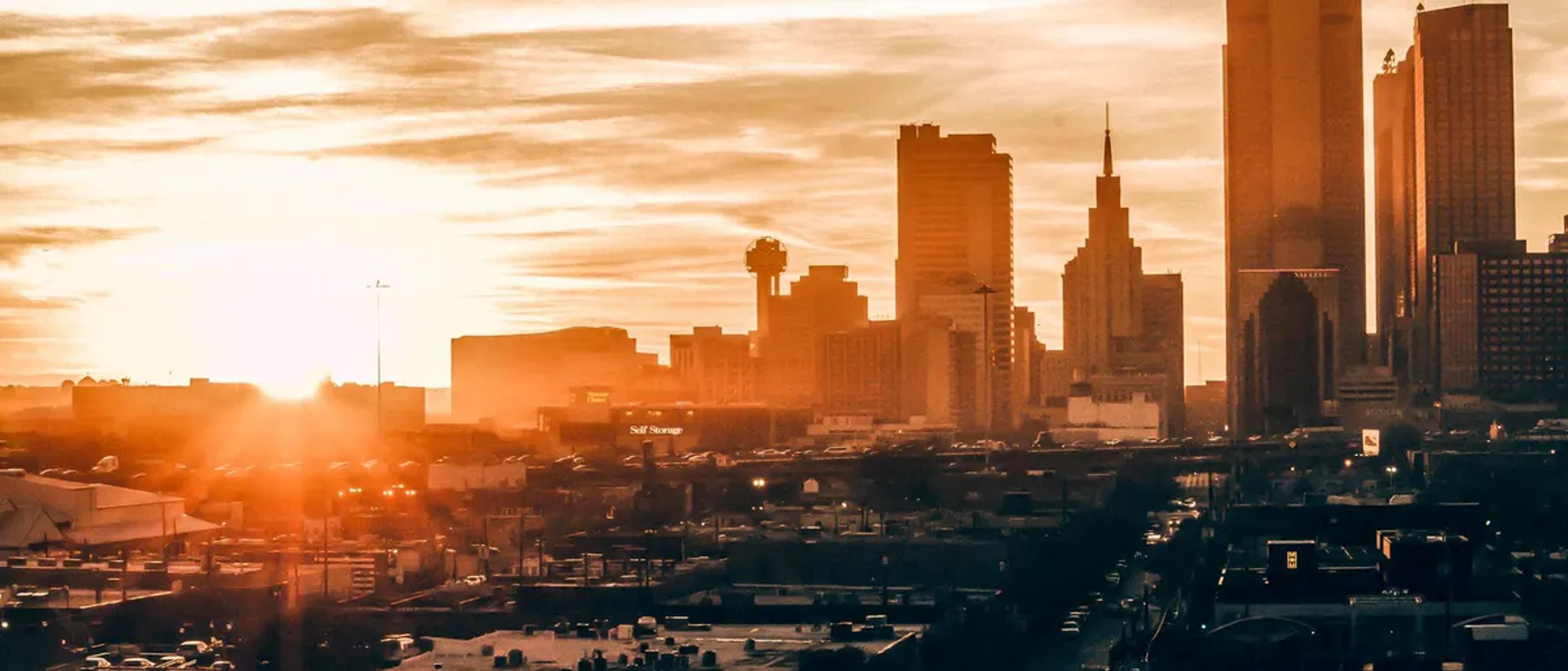 Downtown Dallas skyline at sunset with Reunion Tower