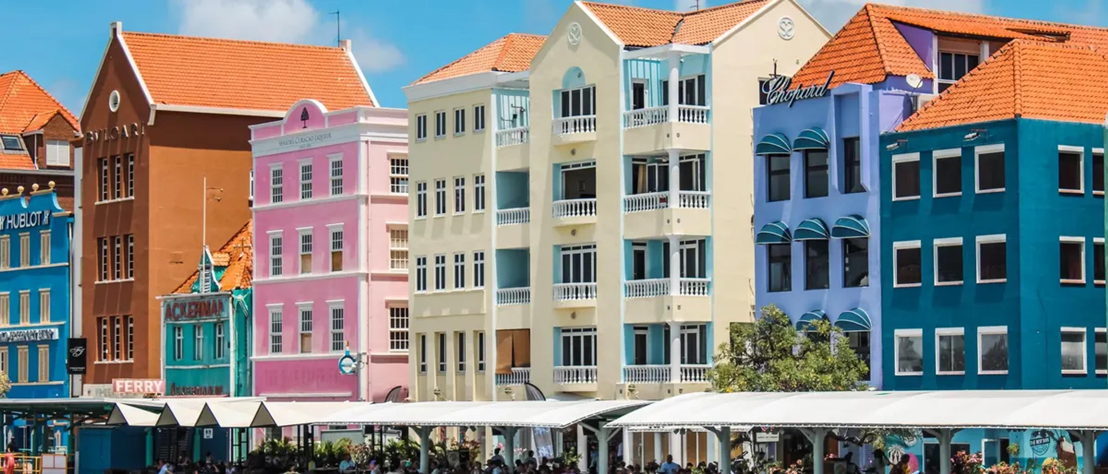 Colorful Dutch colonial buildings along the Willemstad waterfront in Curaçao