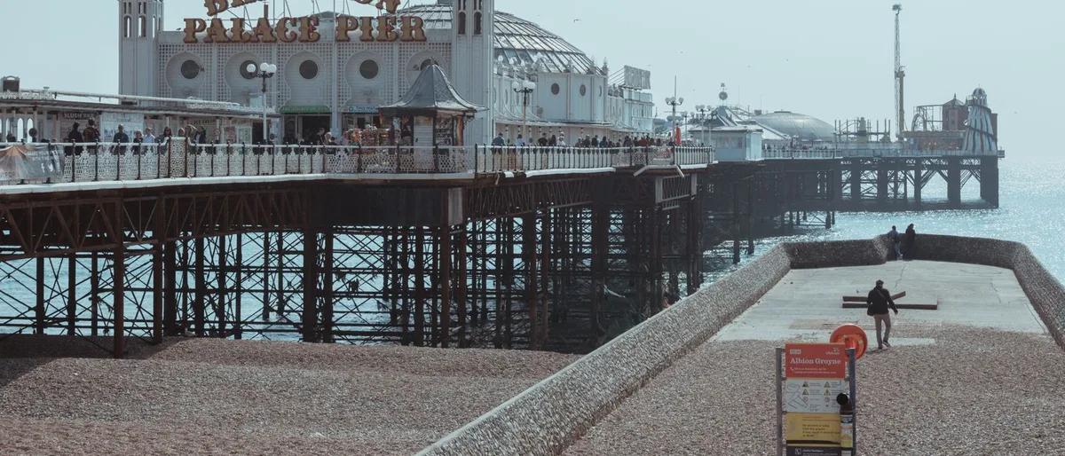 Brighton Palace Pier on a clear day, seen from the beach