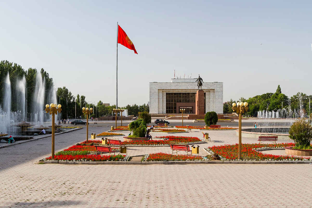 Ala Too Square in Bishkek, Kyrgyzstan: Famous landmark with the Kyrgyz flag, fountains, and monuments.
