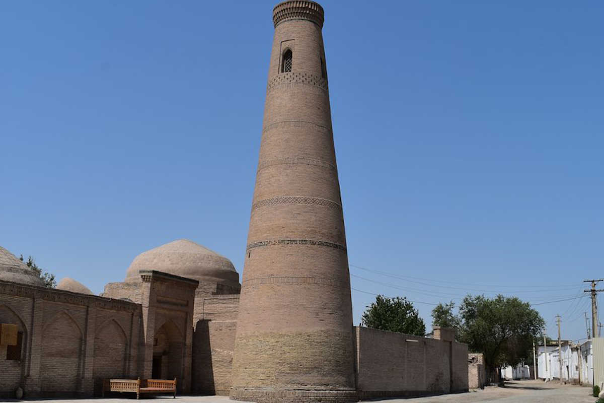 Historic minaret of the Bikanjan Bika Madrasah in the UNESCO old town of Khiva, Uzbekistan.