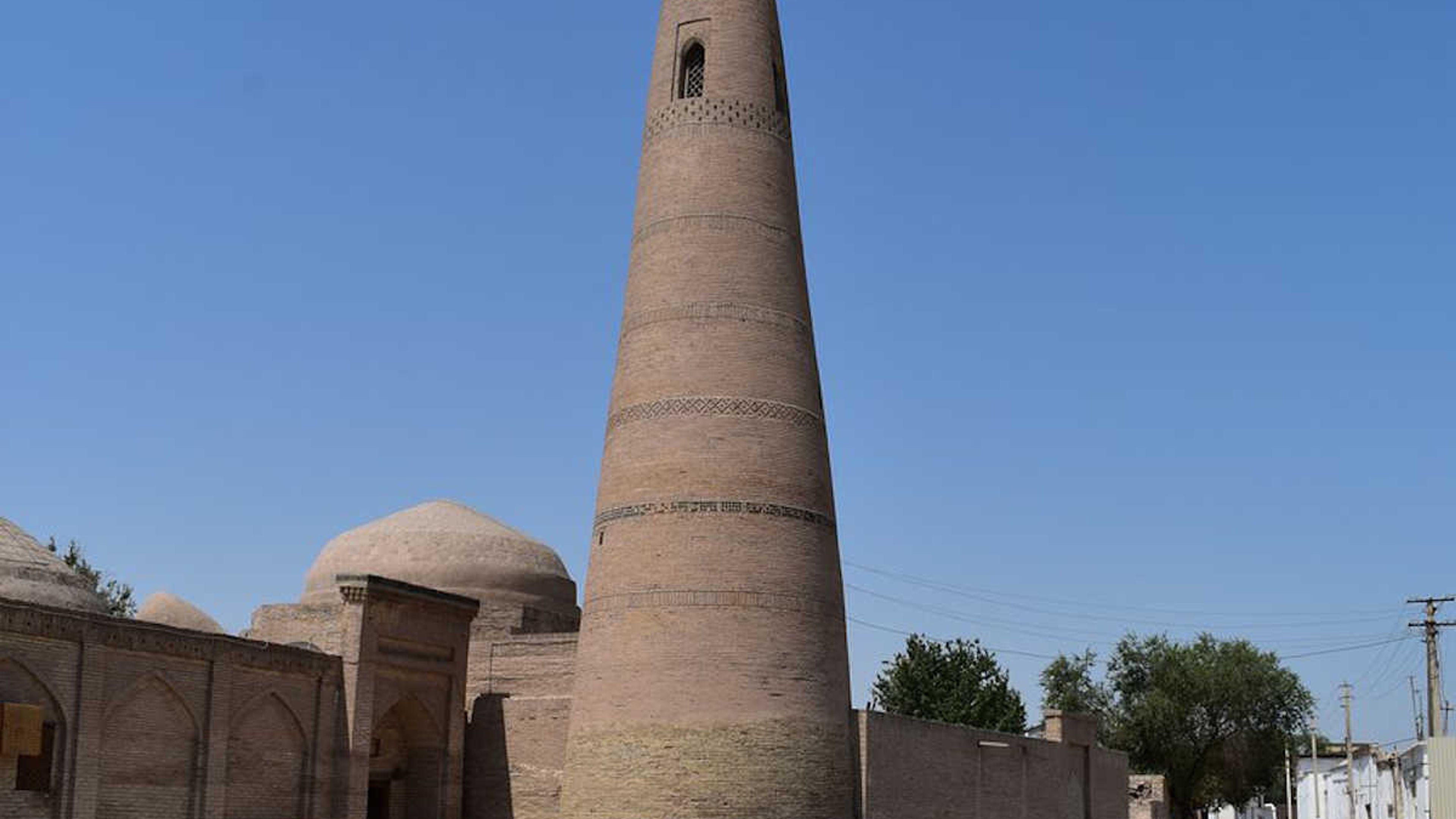 Historic minaret of the Bikanjan Bika Madrasah in the UNESCO old town of Khiva, Uzbekistan.