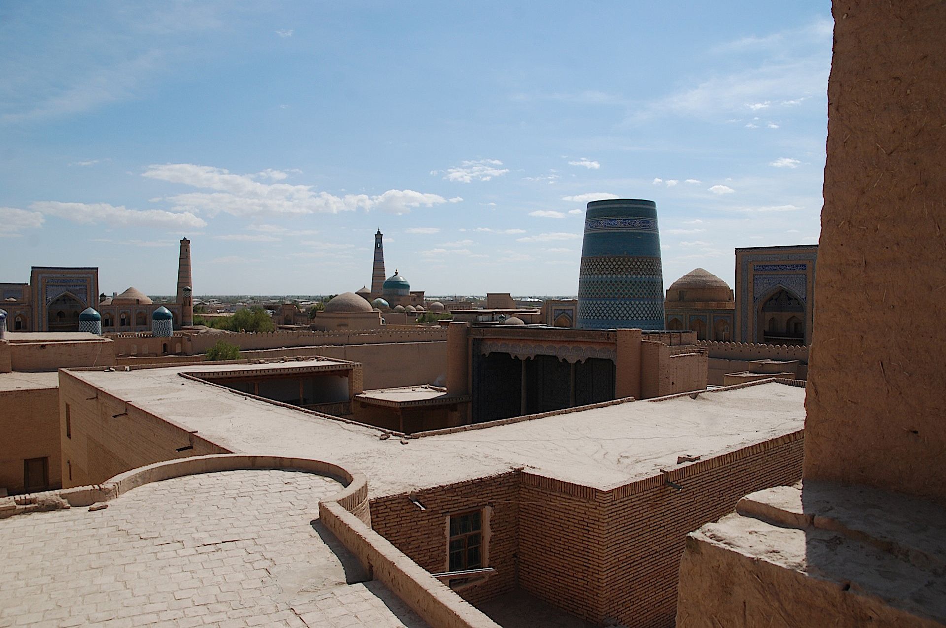Panoramic view of the UNESCO historic old town of Khiva, Uzbekistan, featuring the iconic Kalta Minor Minaret.
