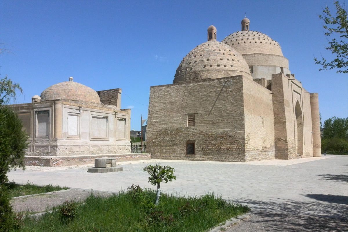 Sayf ad-Din Baharzi Mausoleum in Bukhara, Uzbekistan, historical landmark with domes.