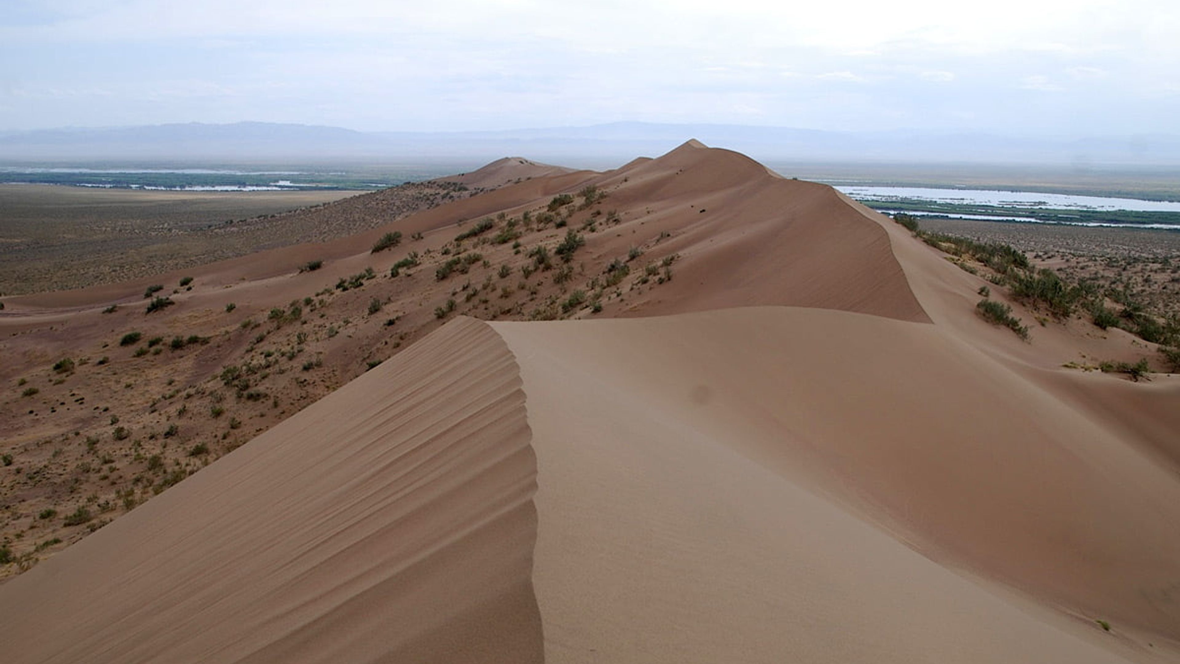 View of the Singing Dune in Altyn Emel National Park near Almaty, Kazakhstan, a popular tourist attraction.